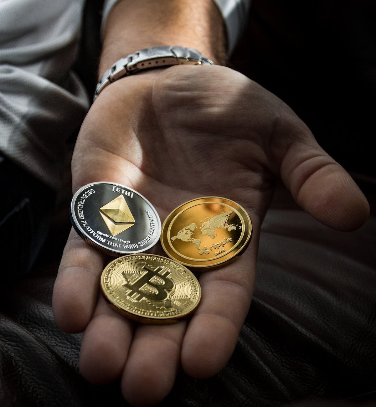Photo by Worldspectrum on <a href="https://www.pexels.com/photo/closeup-photo-of-three-round-coins-in-person-s-palm-1097946/" rel="nofollow">Pexels.com</a>